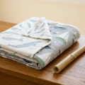 Blue Shadow Whales and Marina Sailboats Bamboo Newcastle Blanket - Material Story